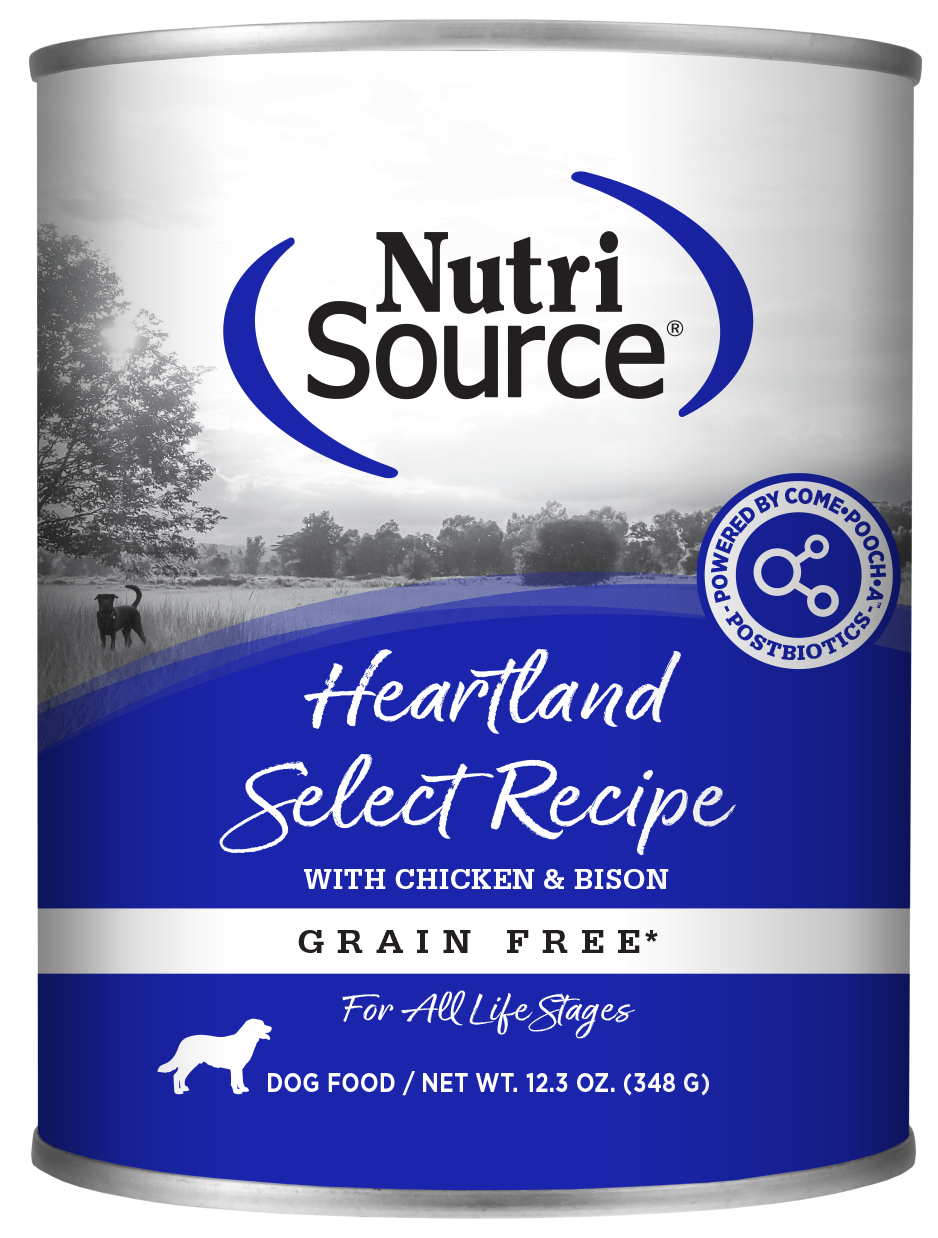 A can of NutriSource Heartland Select Recipe dog food with chicken and bison. The can has blue and white color scheme with an image of a dog in a field in the background.