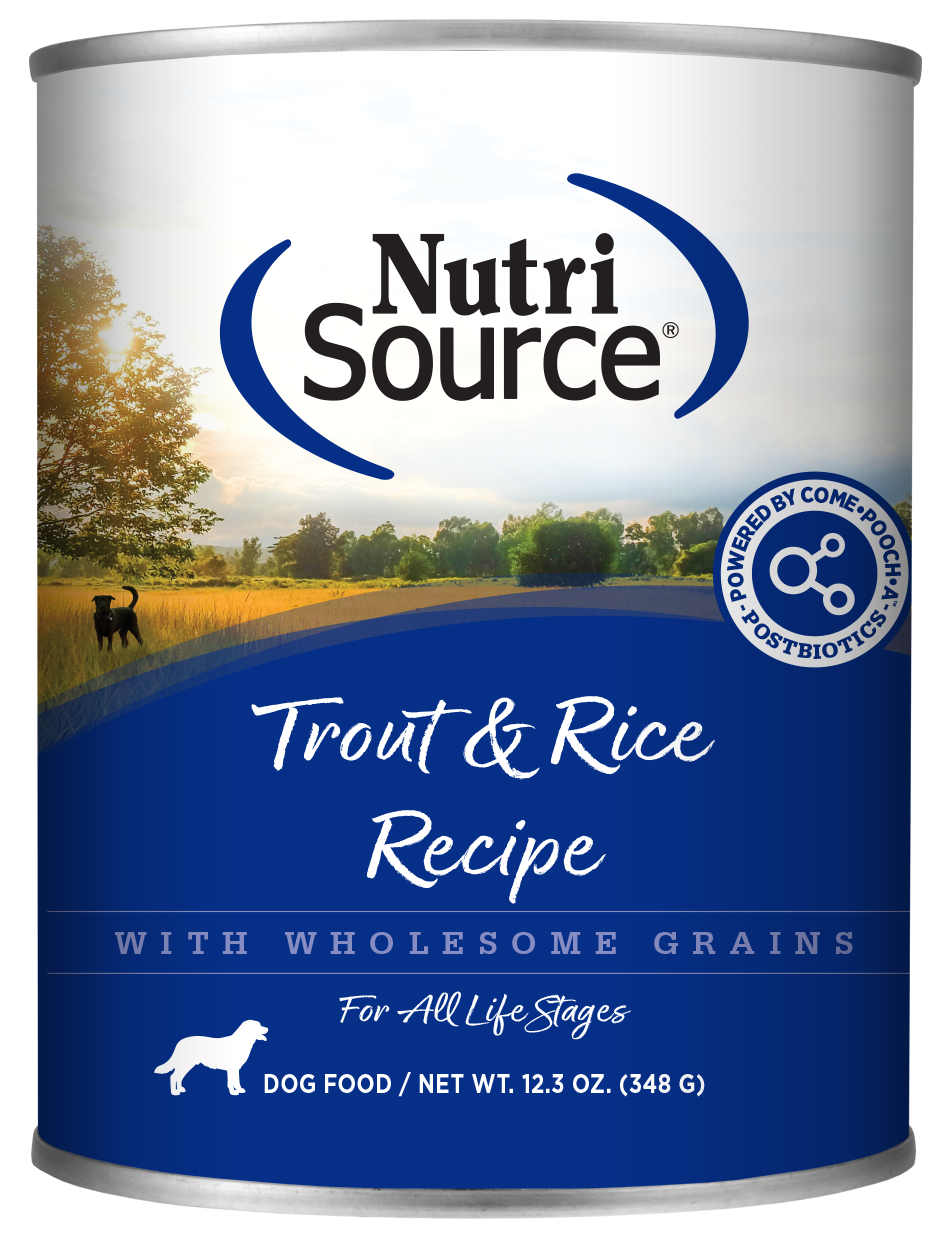 A can of NutriSource Trout & Rice Recipe dog food with a scenic background featuring a dog running in a field.