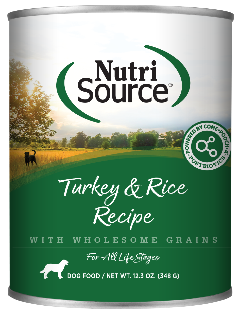 A can of NutriSource Turkey & Rice Recipe dog food with a background depicting a dog in a field.