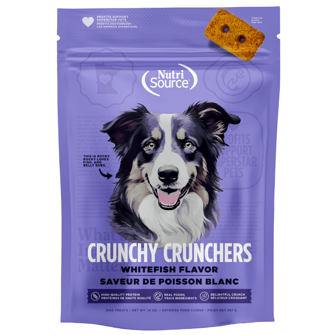 A package of NutriSource Whitefish Crunchy Crunchers dog treats with a picture of a dog in the center