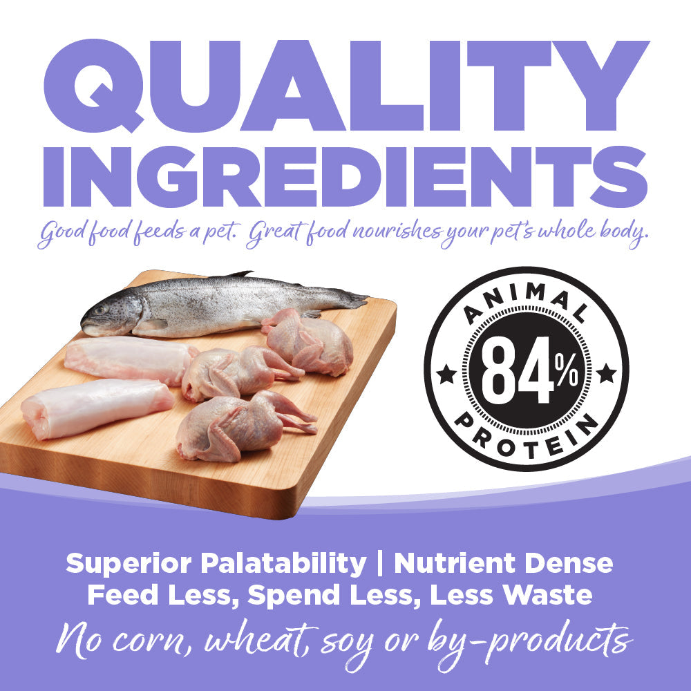 Wooden cutting board with raw chicken pieces and fish, promoting pet food with 84% animal protein content.