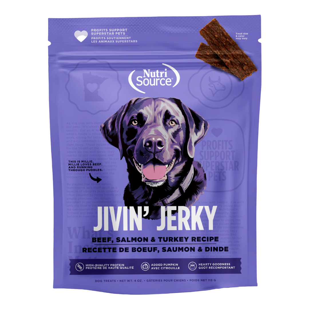A package of NutriSource Beef, Salmon & Turkey Jivin' Jerky dog treats with an image of a happy dog on the front.