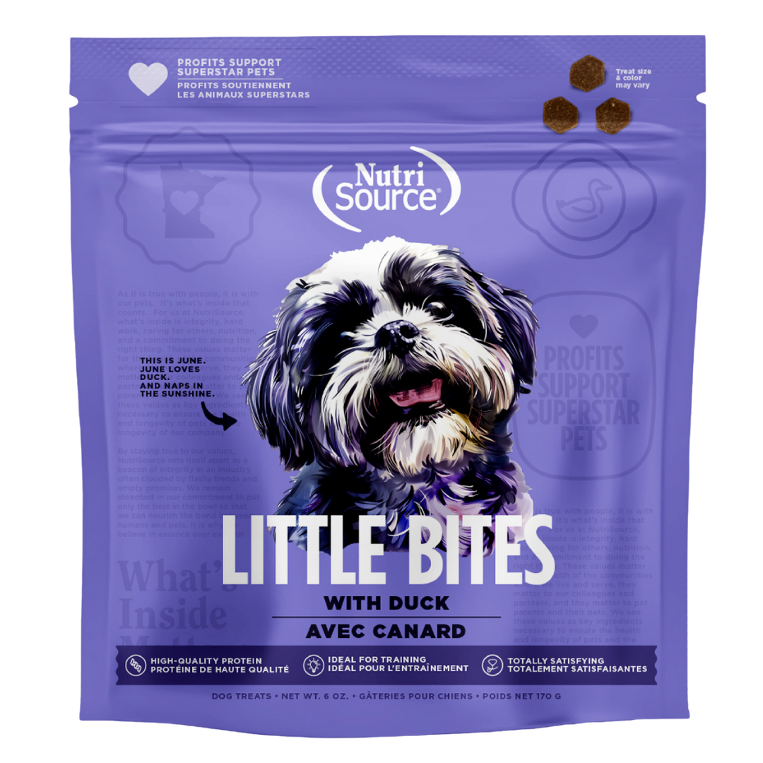 A package of NutriSource Duck Little Bites dog treats with an image of a dog on the front.