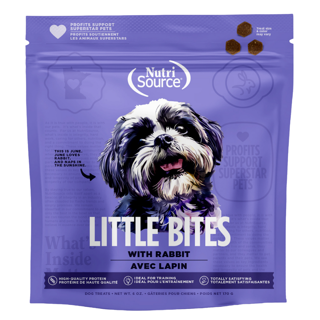 A package of NutriSource Little Bites with Rabbit featuring an image of a dog on a purple background.